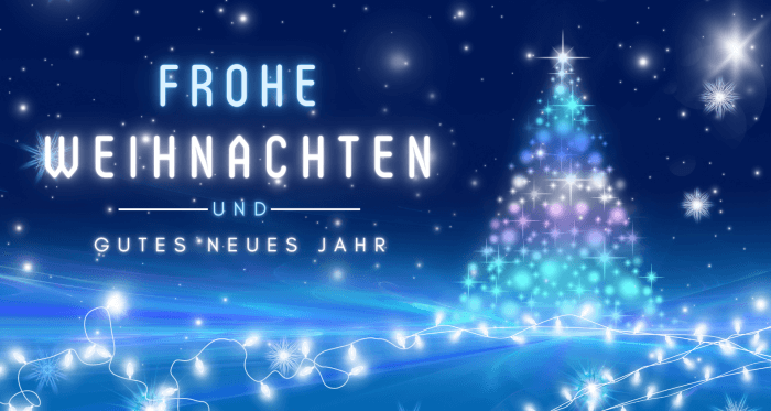 Frohe Weihnachten in blau mit Tannenbaum und leuchtenden Elementen